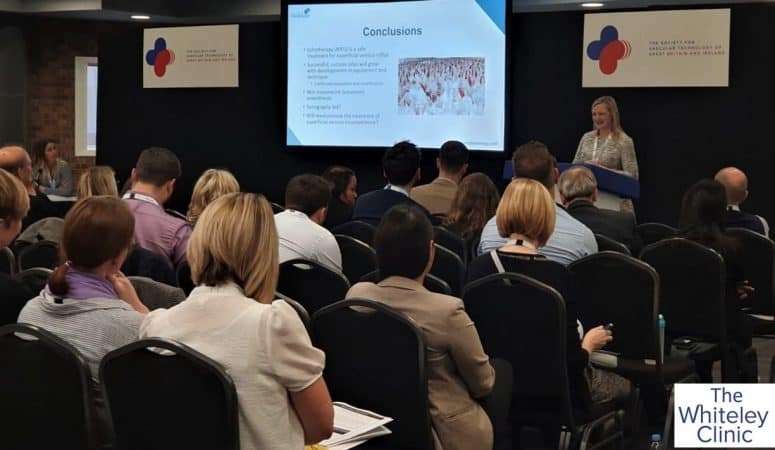 Angie White giving the prize winning talk on HIFU Sonovein treatment of Varicose Veins at The Whiteley Clinic Nov 2019